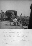 Photograph: Marlene Dietrich in front of some soldiers