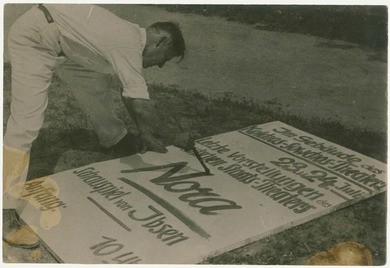 Photograph: Curt Trepte with a poster, 1937 